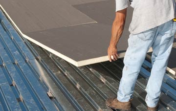 benefits of insulating Llanerfyl flat roofing